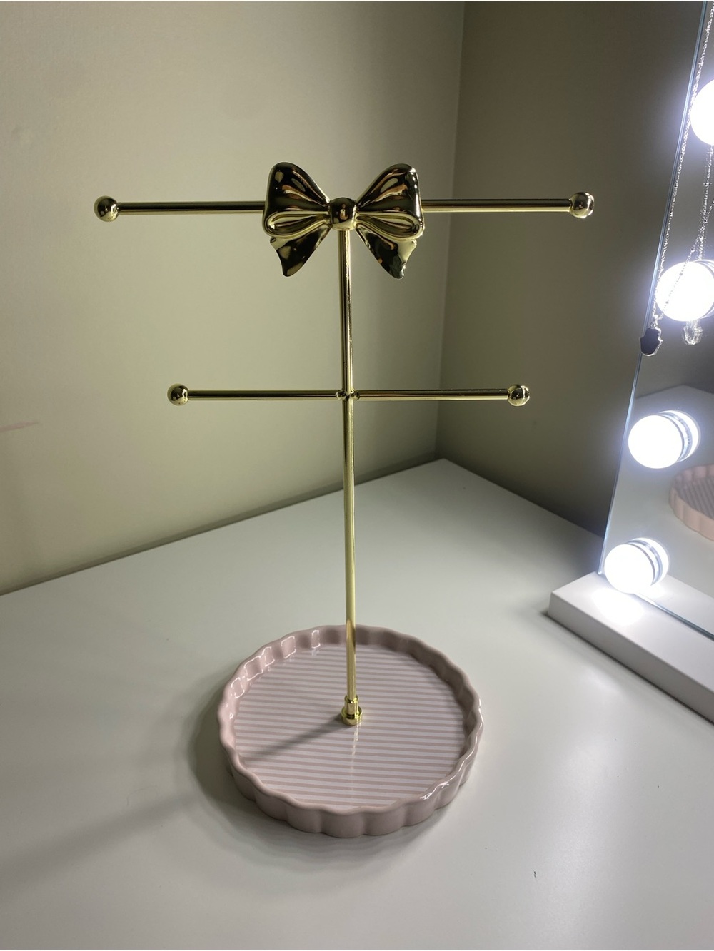 Gold Bow Jewelry Stand with Pink Ceramic Dish